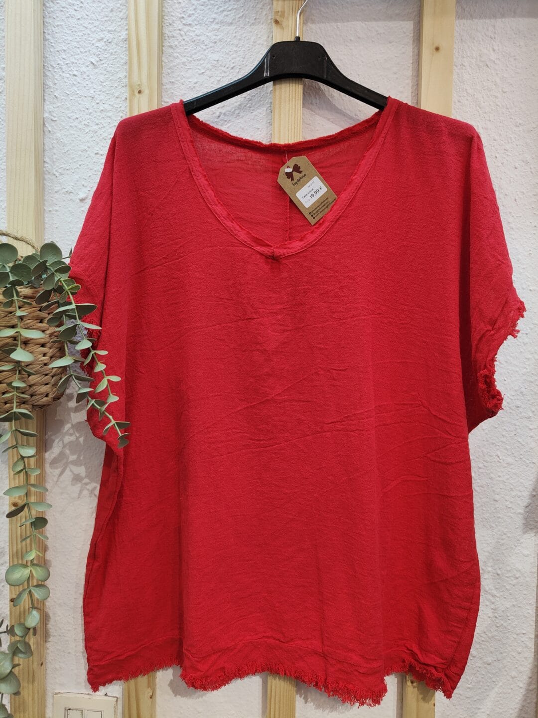 Blusa flecos