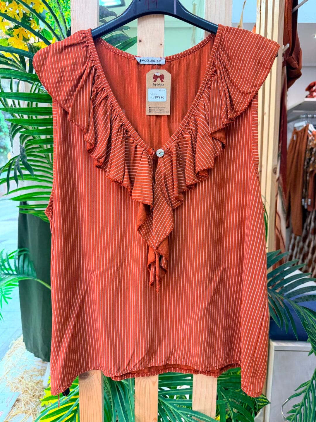 Camiseta de rayas con volantes
