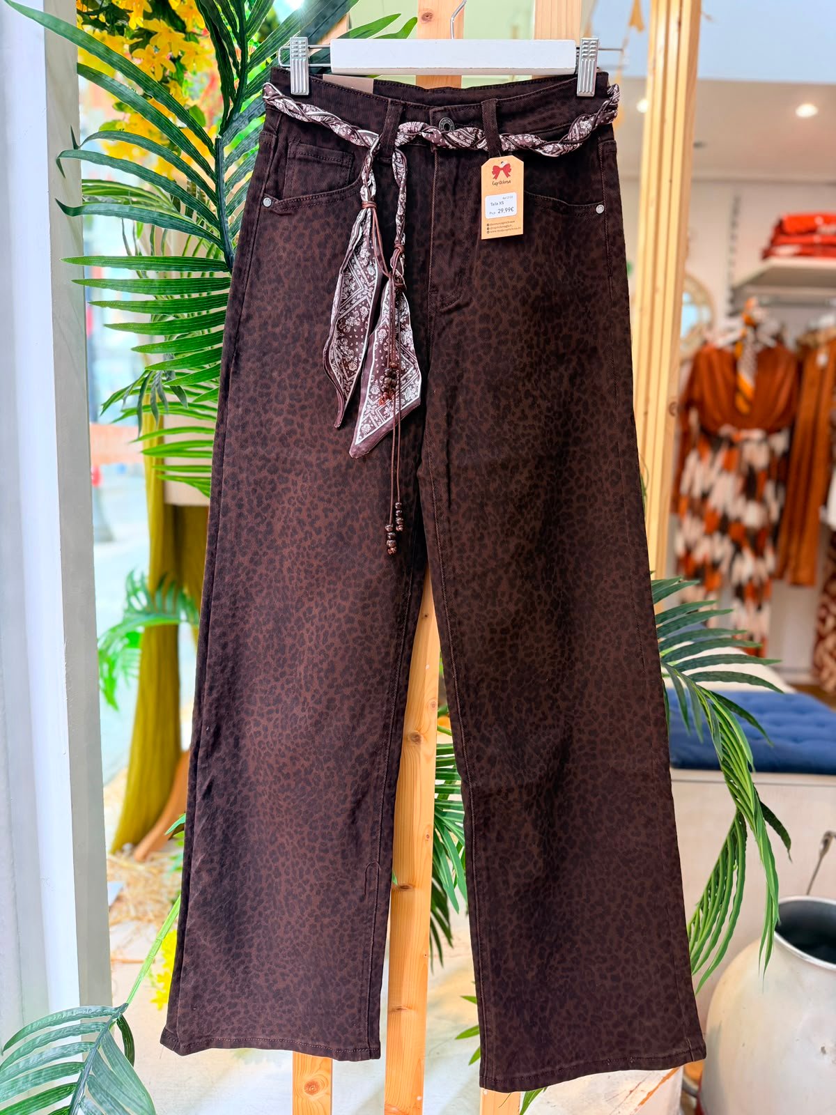 Pantalón estampado leopardo con lazo